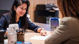 Being served (a customer with a Service NSW team member)